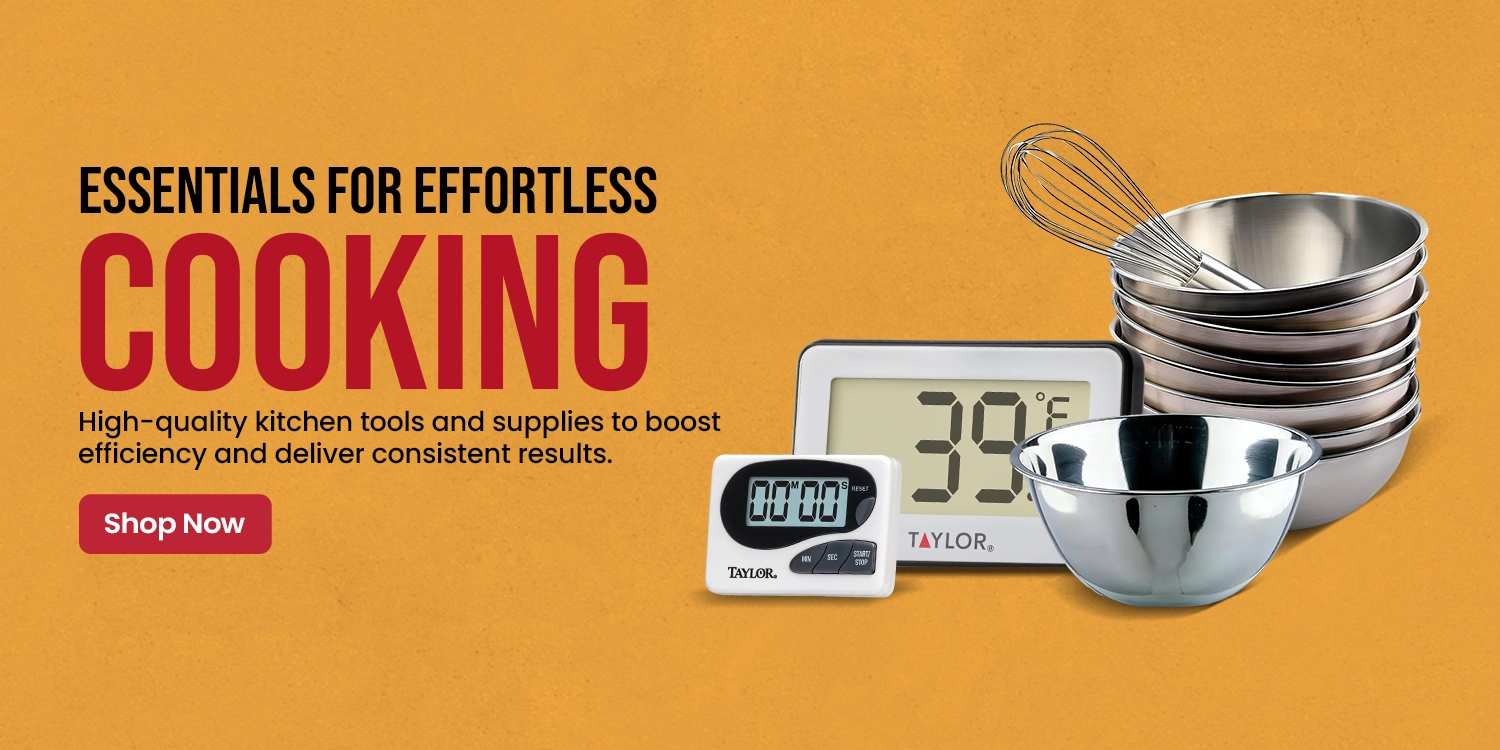 Professional chef knife set with honing rod, scissors, and protective case, laid out on a counter with hand picking up a tool.